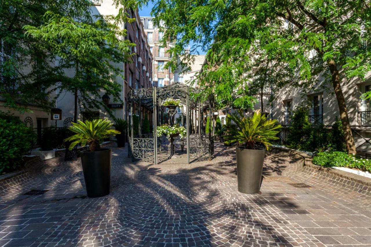 Hotel Les Jardins Du Marais Parigi Esterno foto