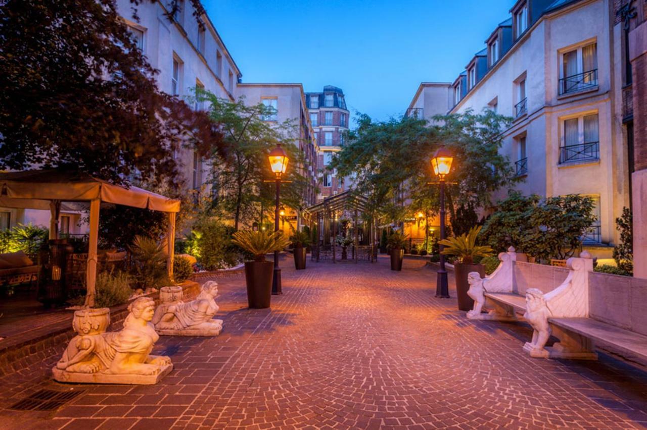 Hotel Les Jardins Du Marais Parigi Esterno foto