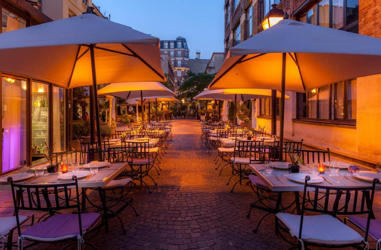 Hotel Les Jardins Du Marais Parigi Esterno foto